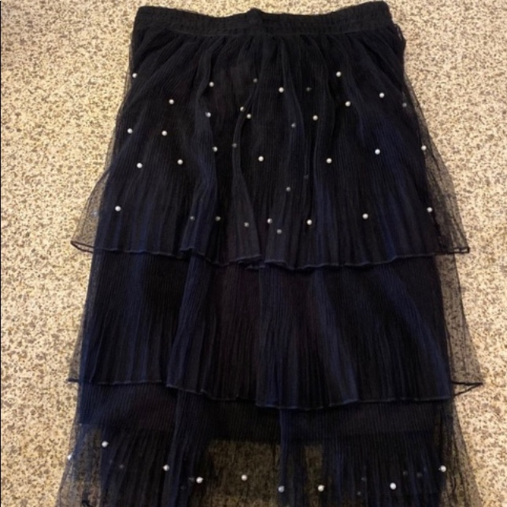 Pearl embossed , tiered tutu